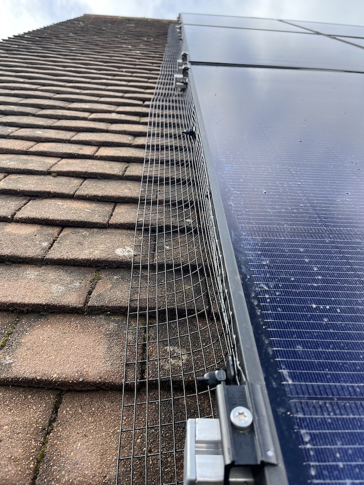 Roof showing solar panels installed in a south facing roof in Hampshire. 