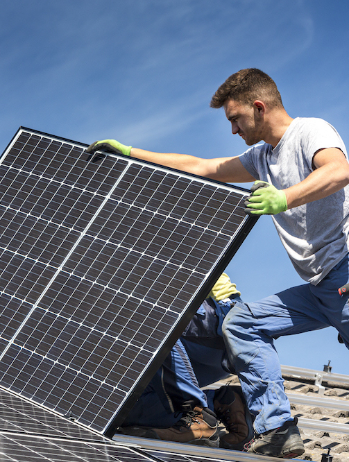 Experts installing solar panels in Sandhurst with precision and care.